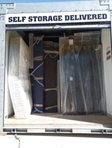 Movers loading and unloading a truck in San Diego